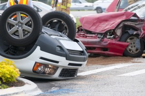 Rollover Vehicle Accident at Busy Intersection With Emergency Pe